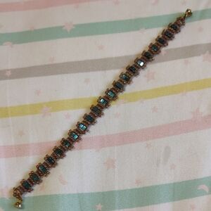 Elegant Gold And Blue Bracelet